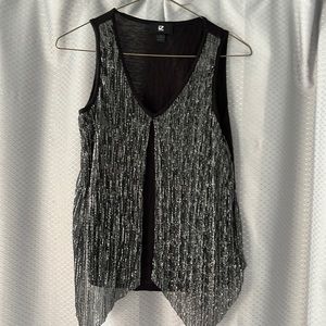 Women’s size small dressy tank, made in Mexico. Very soft.